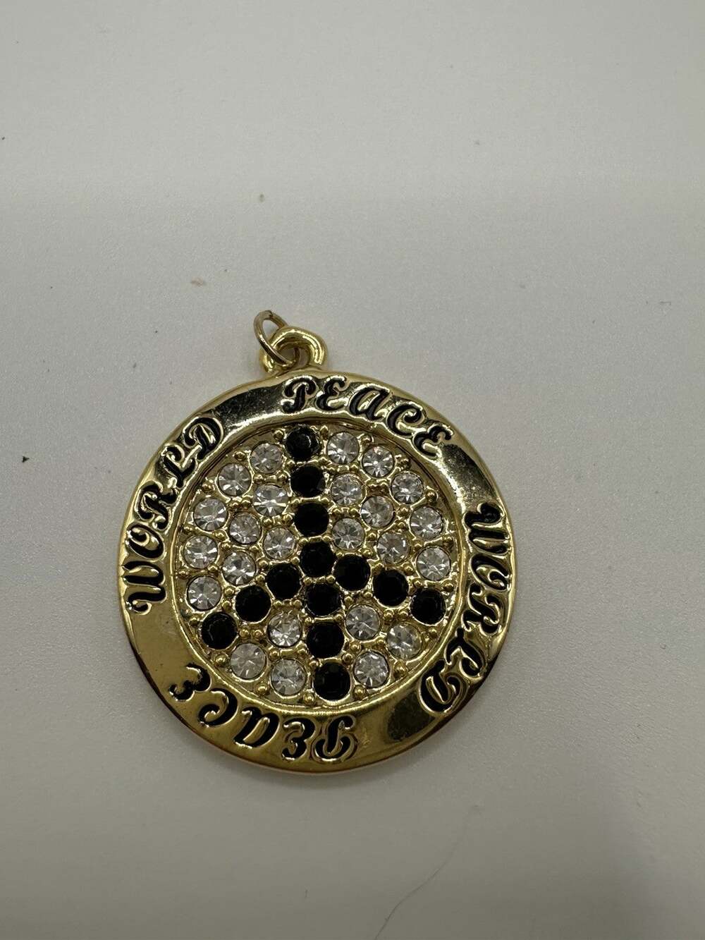 Gold Tone Round Peace Pendant W/Clear & Black Rhinestones 1”